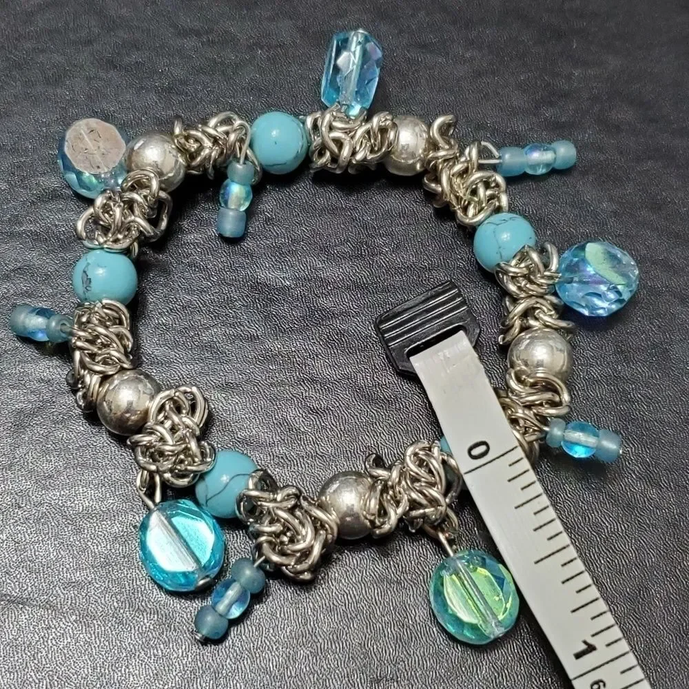 Child's silver tone blue bead bracelet 6